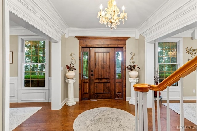 161 Watson Cir, Montgomery, AL 36109 - entrance foyer with a chandelier, wood finished floors, crown molding, and baseboards
