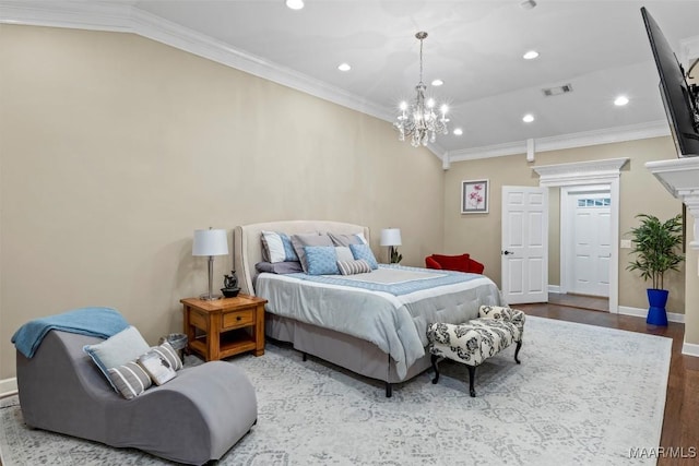 161 Watson Cir, Montgomery, AL 36109 - bedroom featuring recessed lighting, wood finished floors, a chandelier, crown molding, and baseboards