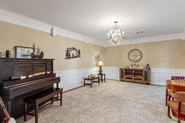161 Watson Cir, Montgomery, AL 36109 - living area with a chandelier, ornamental molding, and wainscoting