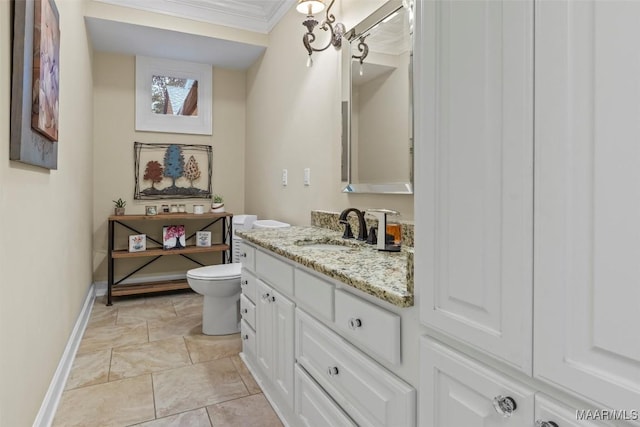 161 Watson Cir, Montgomery, AL 36109 - bathroom featuring vanity, toilet, crown molding, baseboards, and stone finish flooring