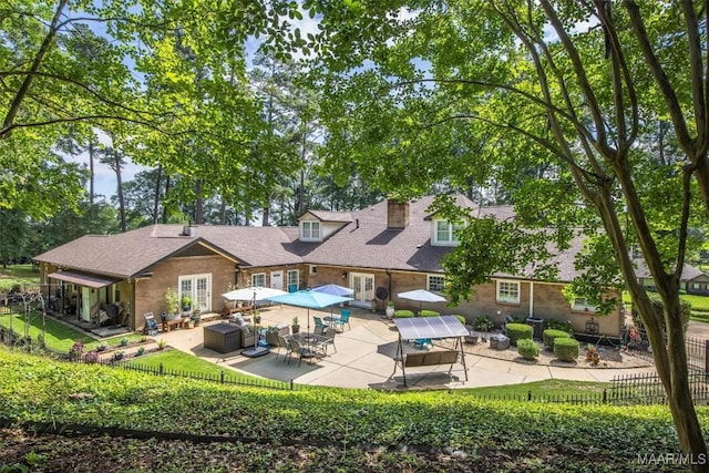 161 Watson Cir, Montgomery, AL 36109 - rear view of house with french doors, a patio, and outdoor dining area