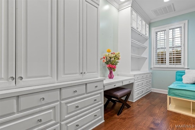 161 Watson Cir, Montgomery, AL 36109 - home office featuring baseboards, ornamental molding, dark wood-style flooring, and built in study area