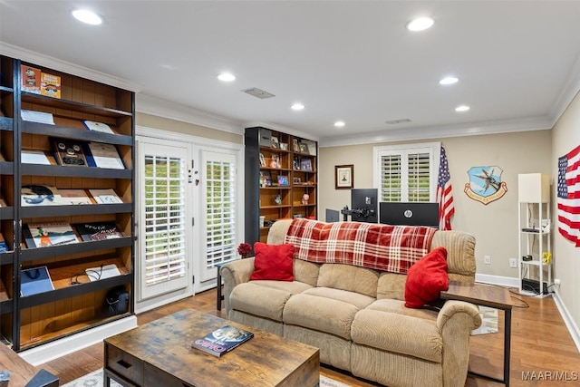 161 Watson Cir, Montgomery, AL 36109 - living area featuring crown molding, recessed lighting, wood finished floors, and baseboards
