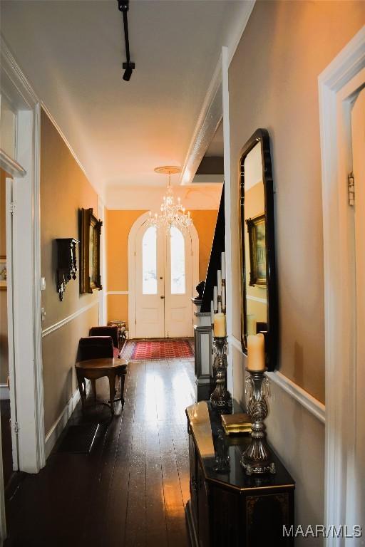 402 S Perry St, Montgomery, AL 36104 - foyer entrance featuring a chandelier and dark wood-style flooring