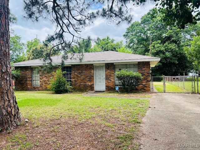 519 Woodbrook Dr, Montgomery, AL 36110 - view of front facade featuring a gate and brick siding