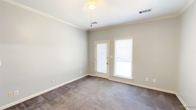 1571 Meriwether Cir, Montgomery, AL 36117 - unfurnished room with carpet flooring, baseboards, crown molding, and ceiling fan