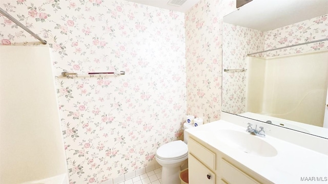 1571 Meriwether Cir, Montgomery, AL 36117 - bathroom featuring vanity, toilet, tile patterned flooring, a shower, and wallpapered walls