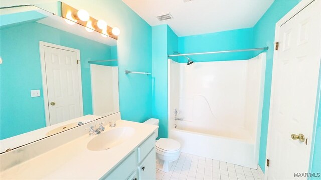 1571 Meriwether Cir, Montgomery, AL 36117 - bathroom featuring vanity, toilet, shower / tub combination, and tile patterned flooring