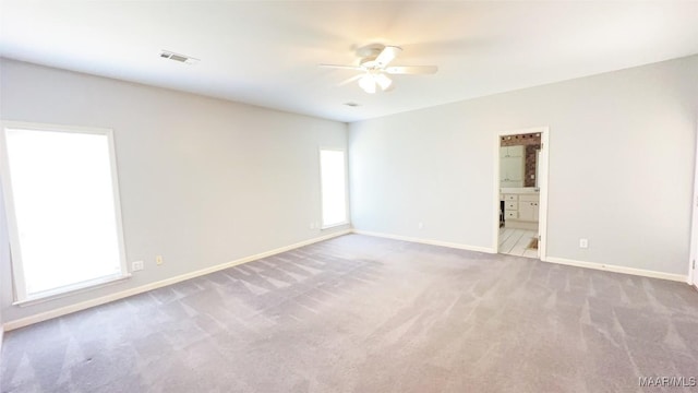1571 Meriwether Cir, Montgomery, AL 36117 - carpeted spare room featuring a ceiling fan, healthy amount of natural light, and baseboards