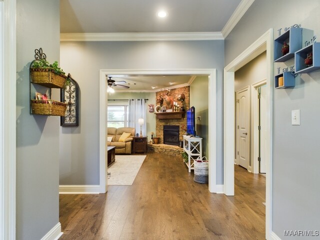 661 Blackberry Rd, Deatsville, AL 36022 - corridor featuring wood finished floors, ornamental molding, and baseboards
