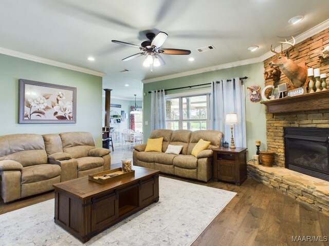 661 Blackberry Rd, Deatsville, AL 36022 - living area featuring wood finished floors, ornamental molding, ceiling fan, recessed lighting, and a fireplace