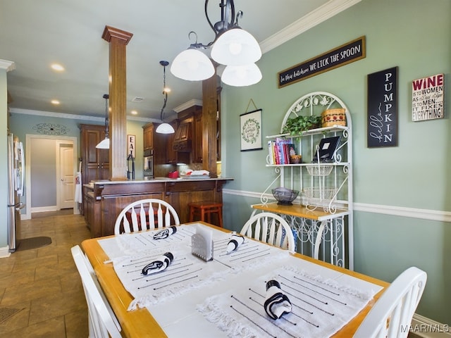 661 Blackberry Rd, Deatsville, AL 36022 - dining space featuring ornamental molding, decorative columns, dark stone finish flooring, baseboards, and recessed lighting
