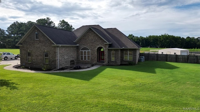 661 Blackberry Rd, Deatsville, AL 36022 - view of front of property featuring brick siding, central air condition unit, and a shingled roof