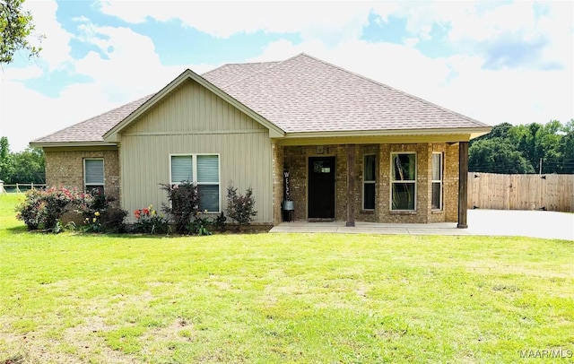 1670 Rifle Range Rd, Wetumpka, AL 36093 - view of front of house featuring roof with shingles, board and batten siding, and brick siding