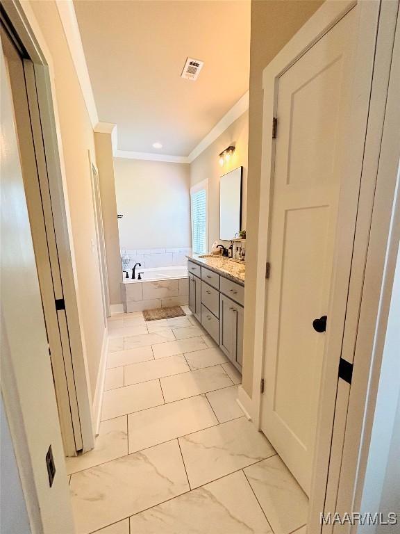 1670 Rifle Range Rd, Wetumpka, AL 36093 - full bath with ornamental molding, double vanity, and a bath