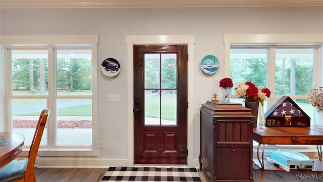 3063 Little Rd, Tallassee, AL 36078 - entrance foyer featuring baseboards, crown molding, and wood finished floors