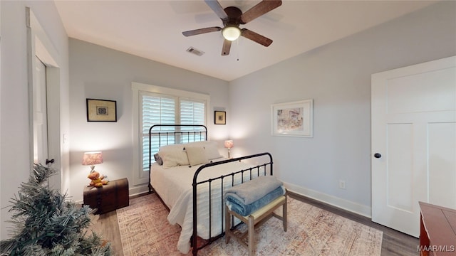 3063 Little Rd, Tallassee, AL 36078 - bedroom featuring wood finished floors, baseboards, and ceiling fan