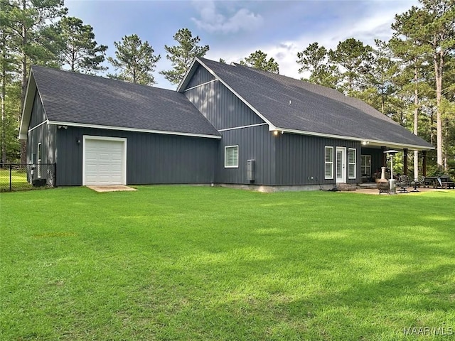 3063 Little Rd, Tallassee, AL 36078 - view of side of home featuring roof with shingles and an attached garage