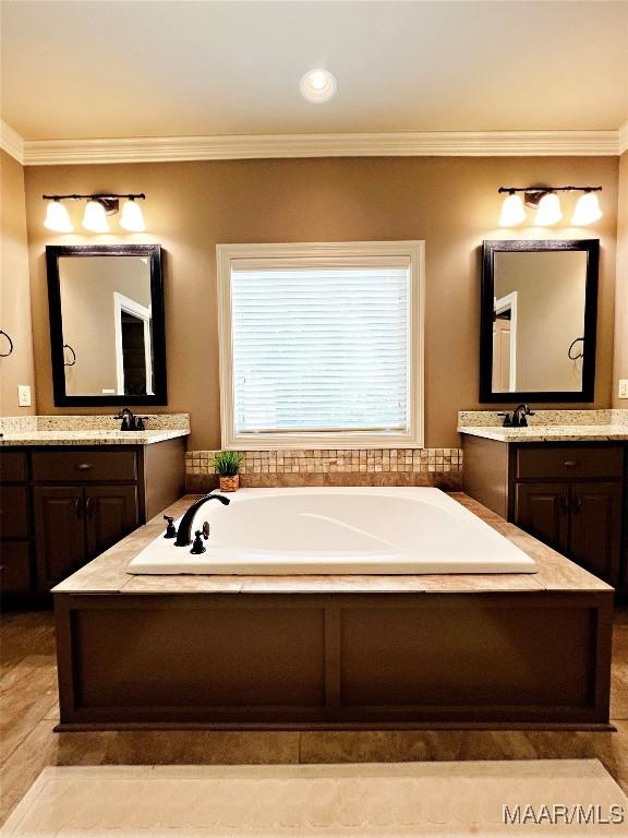 475 Mountain Meadows Ln, Wetumpka, AL 36093 - full bath featuring crown molding, a garden tub, and two vanities