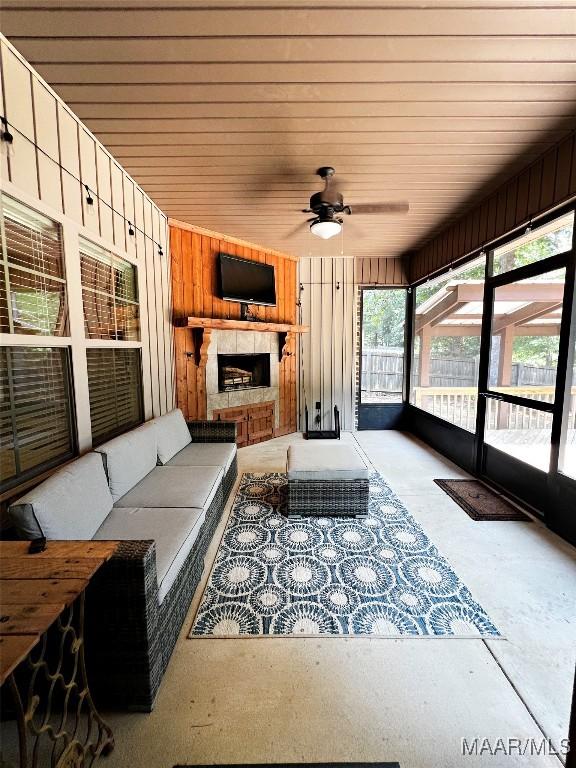 475 Mountain Meadows Ln, Wetumpka, AL 36093 - sunroom / solarium with an outdoor living space with a fireplace and ceiling fan