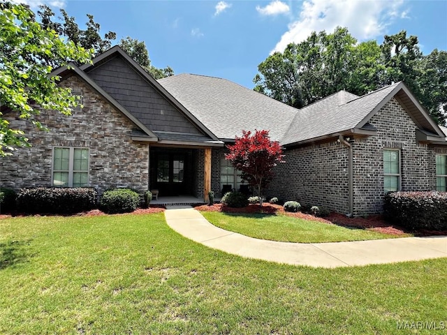 475 Mountain Meadows Ln, Wetumpka, AL 36093 - view of front facade featuring a front lawn, stone siding, and brick siding