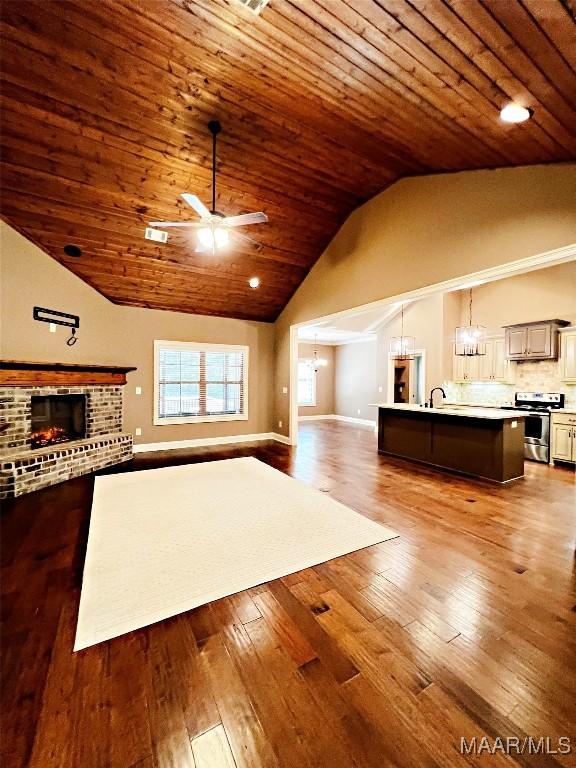 475 Mountain Meadows Ln, Wetumpka, AL 36093 - living area with wood ceiling, a fireplace, high vaulted ceiling, hardwood / wood-style floors, and a ceiling fan