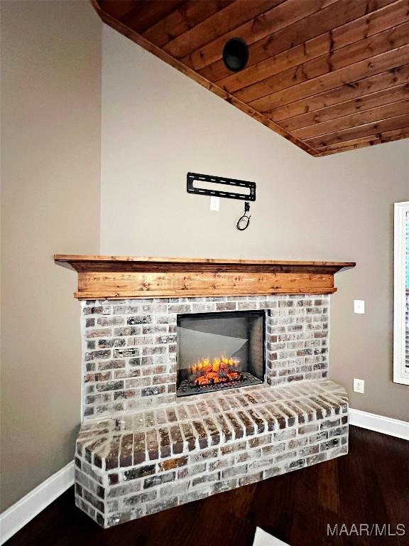 475 Mountain Meadows Ln, Wetumpka, AL 36093 - detailed view of wooden ceiling, baseboards, wood finished floors, and a fireplace