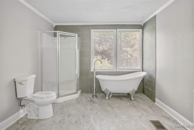 21 Judge Ests, Hope Hull, AL 36043 - bathroom with crown molding, a stall shower, toilet, a soaking tub, and baseboards