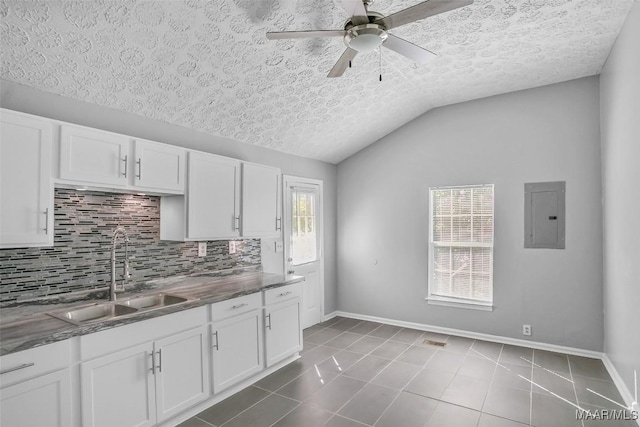 21 Judge Ests, Hope Hull, AL 36043 - kitchen with a sink, electric panel, a textured ceiling, decorative backsplash, and ceiling fan