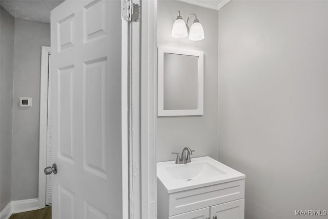 21 Judge Ests, Hope Hull, AL 36043 - bathroom with vanity, baseboards, and wood finished floors