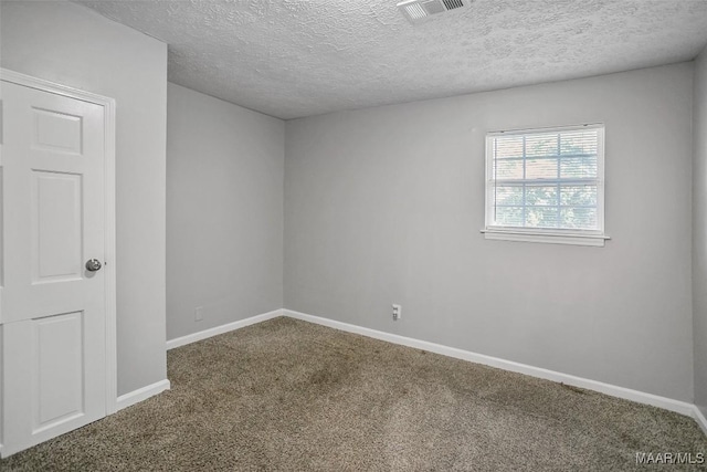21 Judge Ests, Hope Hull, AL 36043 - carpeted empty room with baseboards and a textured ceiling