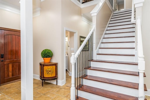 3900 Turning Leaf Loop, Montgomery, AL 36116 - stairway featuring ornamental molding, stone tile flooring, and baseboards