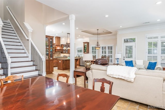 3900 Turning Leaf Loop, Montgomery, AL 36116 - dining area featuring crown molding, stairway, recessed lighting, and ornate columns