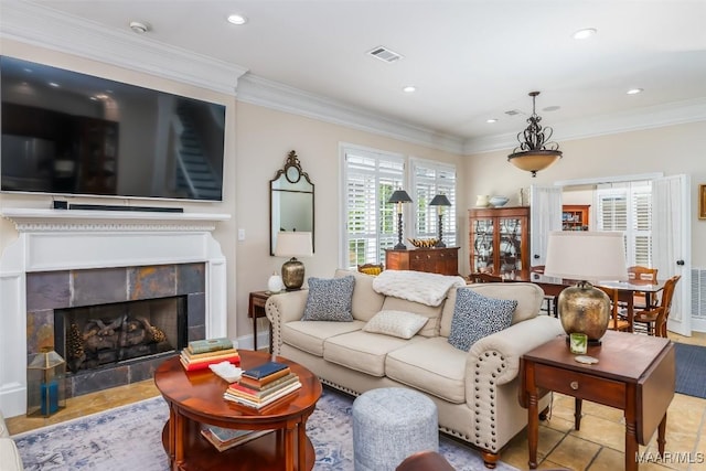 3900 Turning Leaf Loop, Montgomery, AL 36116 - living room with ornamental molding, recessed lighting, and a fireplace