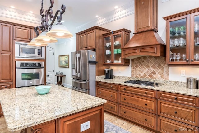 3900 Turning Leaf Loop, Montgomery, AL 36116 - kitchen with appliances with stainless steel finishes, decorative backsplash, light stone counters, ornamental molding, and pendant lighting