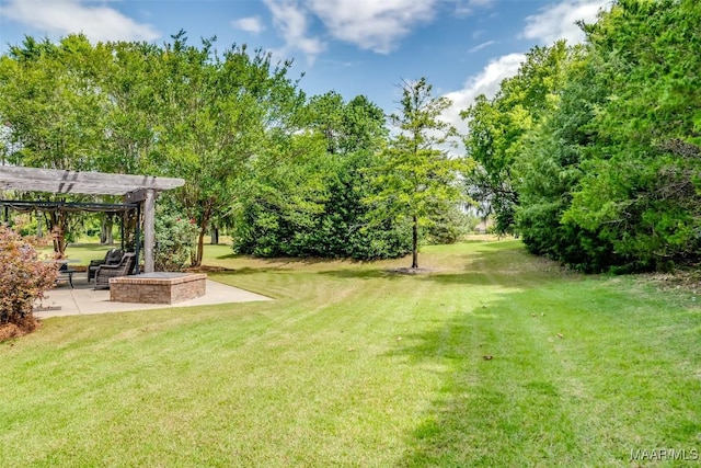 3900 Turning Leaf Loop, Montgomery, AL 36116 - view of grassy yard featuring a pergola and a patio area