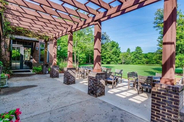 3900 Turning Leaf Loop, Montgomery, AL 36116 - view of patio / terrace featuring a pergola and outdoor dining space