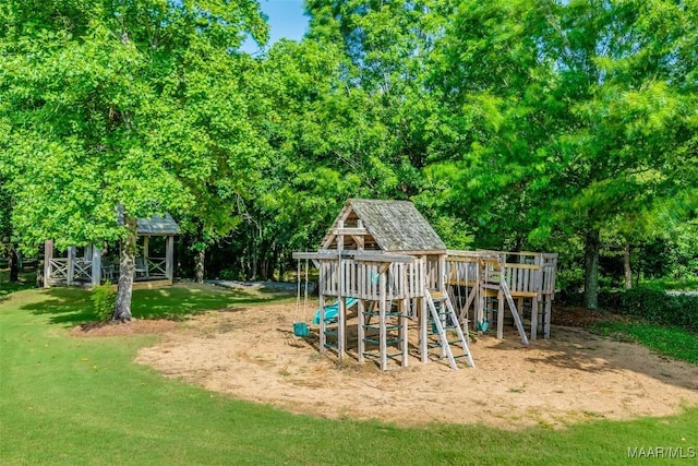 3900 Turning Leaf Loop, Montgomery, AL 36116 - view of jungle gym with a yard and view of scattered trees