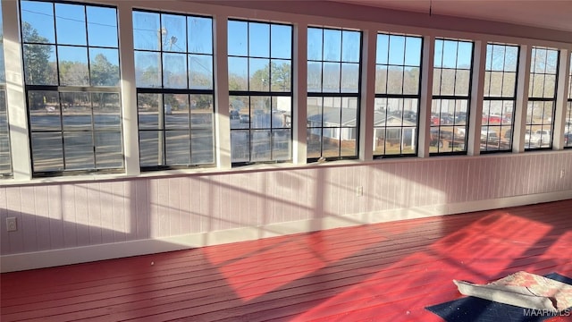 610 Booth Rd, Montgomery, AL 36108 - unfurnished sunroom with wood finished floors and a wooden deck
