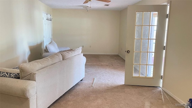 610 Booth Rd, Montgomery, AL 36108 - carpeted living area with a ceiling fan and baseboards