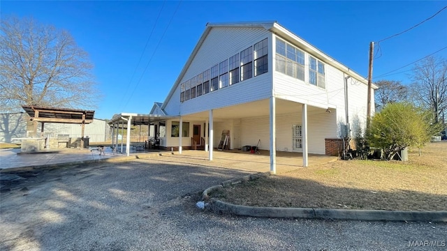 610 Booth Rd, Montgomery, AL 36108 - back of property with a carport