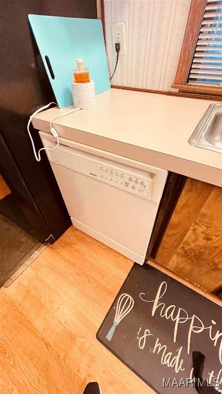 610 Booth Rd, Montgomery, AL 36108 - kitchen view of wood finished floors and white dishwasher