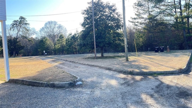 610 Booth Rd, Montgomery, AL 36108 - view of asphalt street featuring curbs