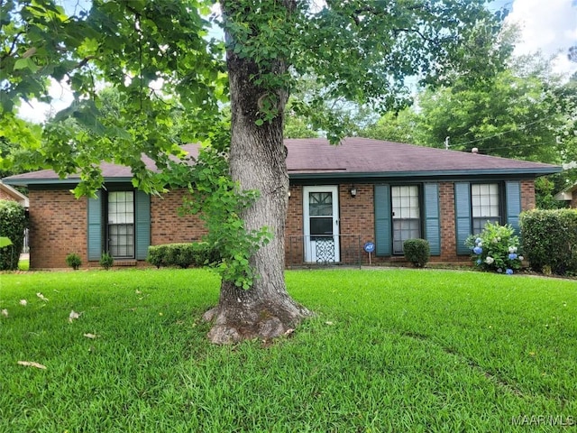 329 Sultan Ct, Montgomery, AL 36117 - ranch-style house featuring a front yard and brick siding