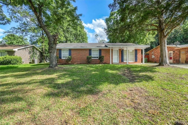 5736 Roxboro Dr, Montgomery, AL 36117 - ranch-style house with a front yard and brick siding