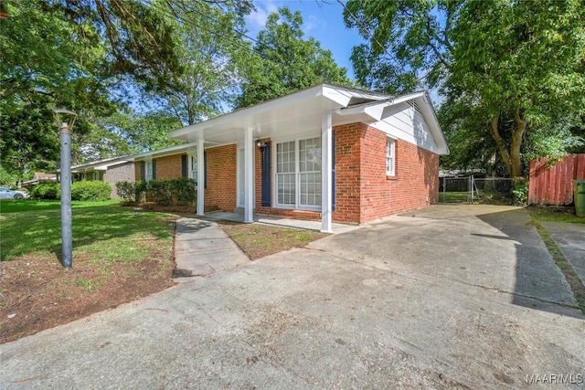 5736 Roxboro Dr, Montgomery, AL 36117 - ranch-style home featuring brick siding and concrete driveway