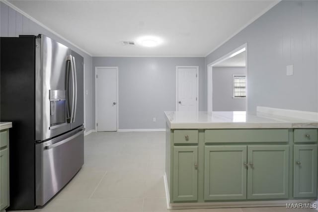 5736 Roxboro Dr, Montgomery, AL 36117 - kitchen with green cabinets, stainless steel fridge with ice dispenser, light countertops, and crown molding