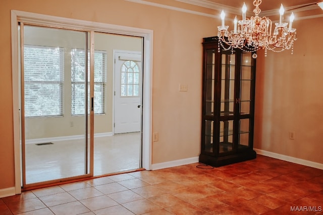 813 Lake Region Cir, Wetumpka, AL 36092 - empty room with ornamental molding, a chandelier, healthy amount of natural light, and light tile patterned flooring