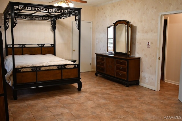 813 Lake Region Cir, Wetumpka, AL 36092 - bedroom with wallpapered walls, crown molding, baseboards, tile patterned floors, and a ceiling fan