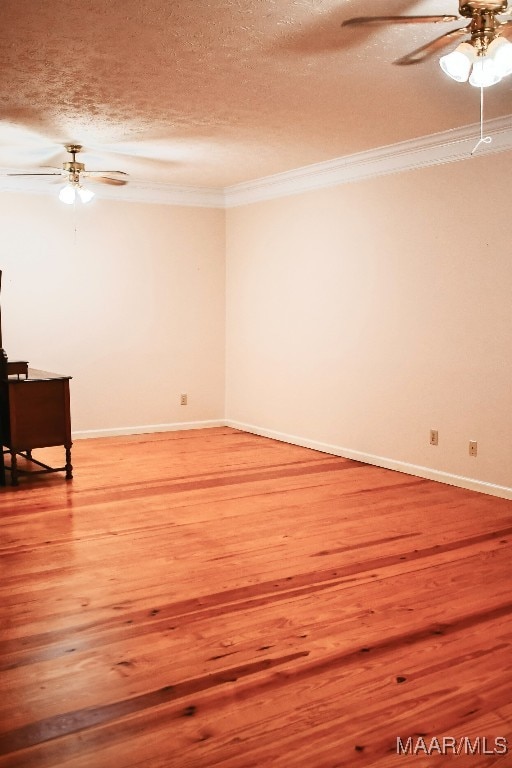 813 Lake Region Cir, Wetumpka, AL 36092 - empty room featuring a ceiling fan, crown molding, a textured ceiling, baseboards, and light wood-style floors